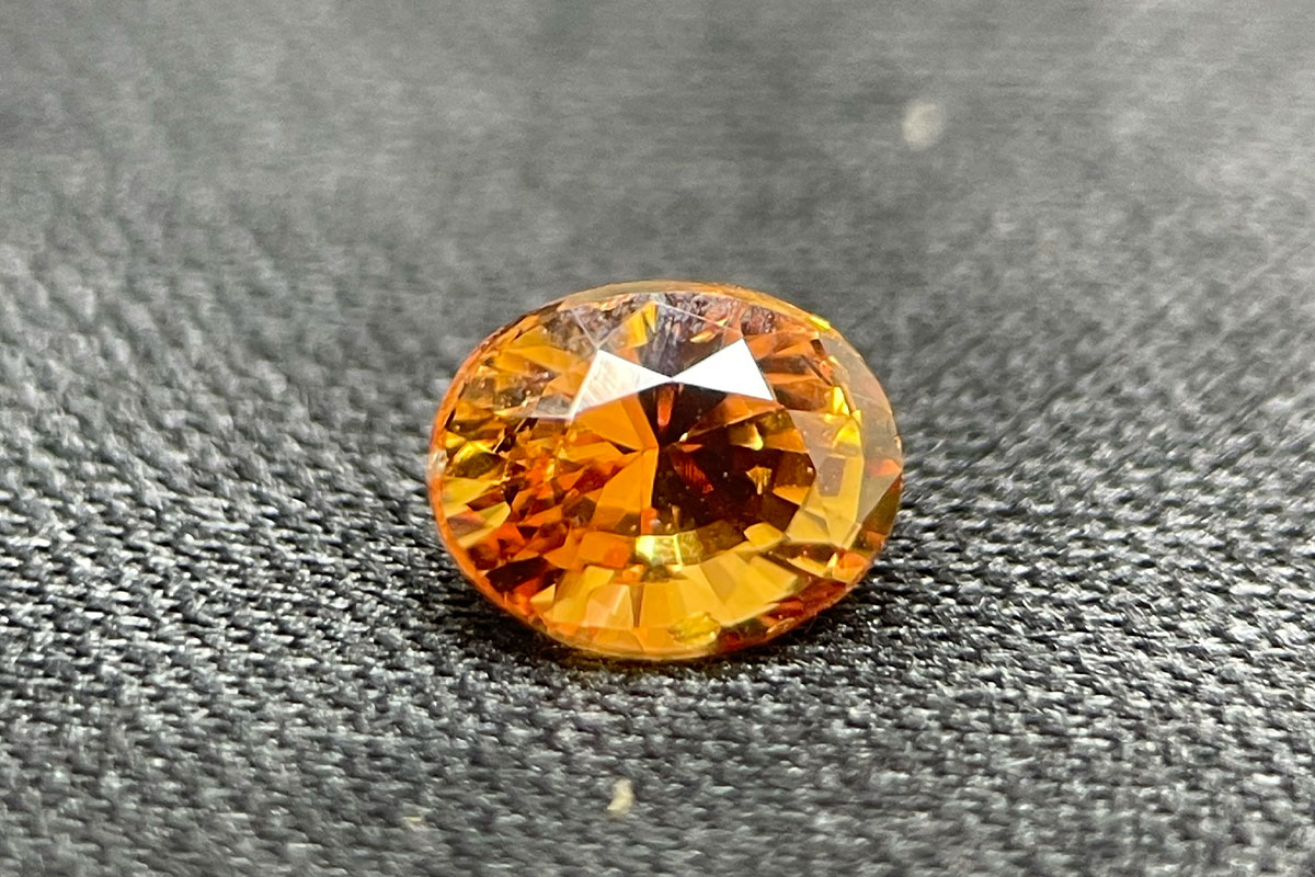 Unheated orange sapphire oval shape, 1.13 carats